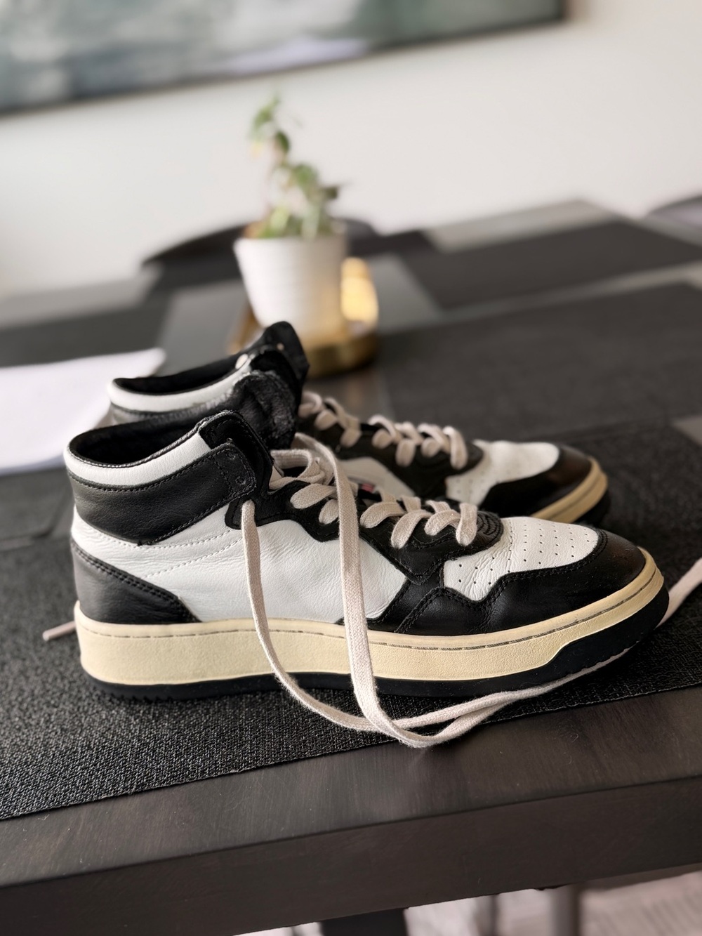 Autry Men’s Medalist Mid-Top Sneakers in Black & White
